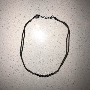 grey string and beaded necklace